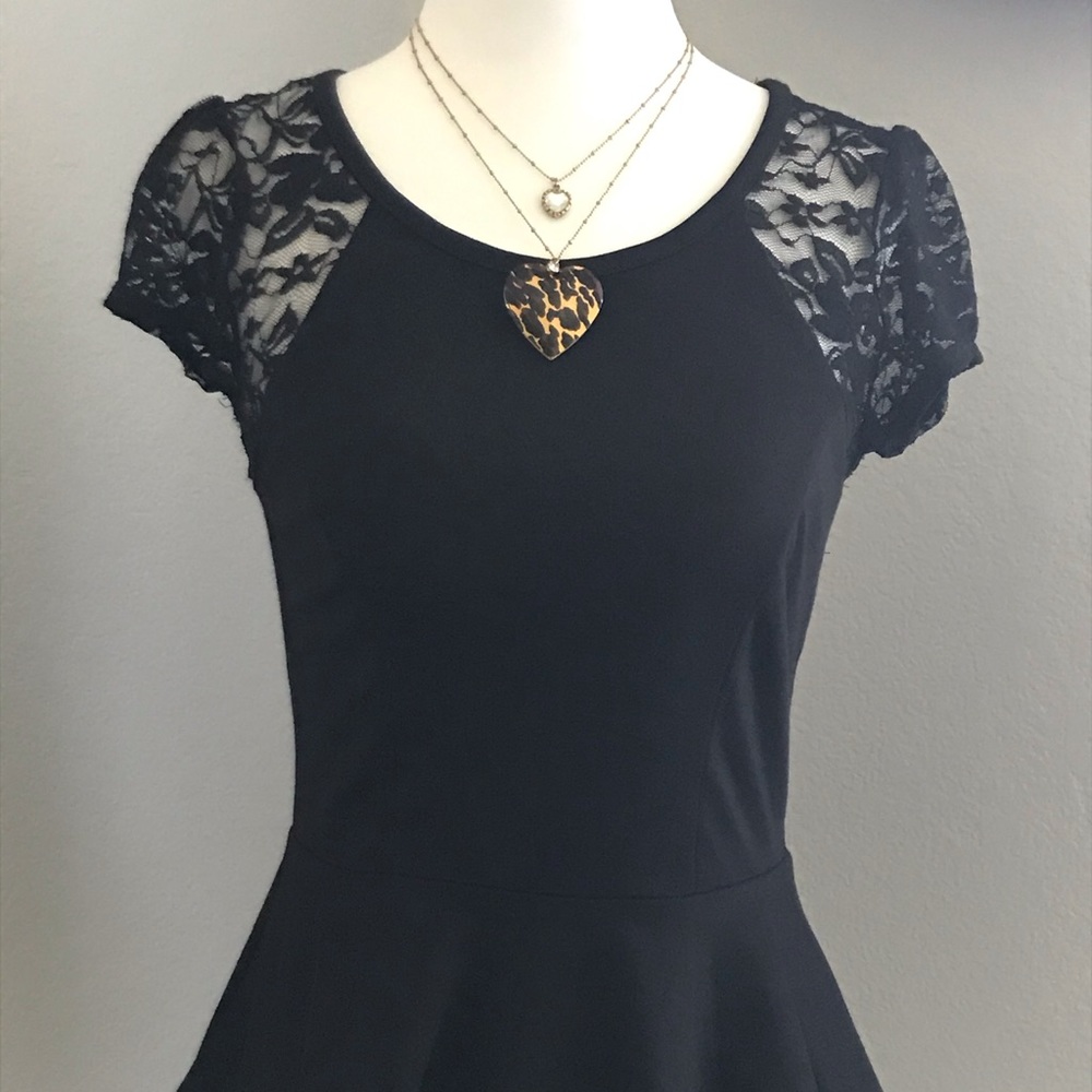 Black peplum top